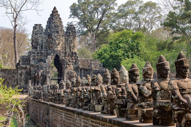 1-Day Angor Wat Small Circuit Tour with Sunset - Ta Prohm brings the famous tree roots