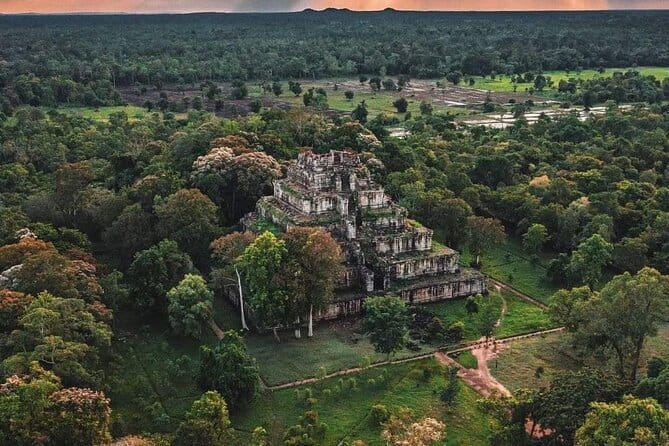 1 day special Tour: Angkor Wat,Bayon,Ta Prohm, Bantey srei and Beng Mealea - Walking beneath the trees at Ta Prohm