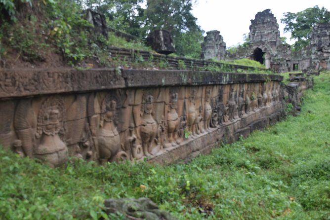 2-D Angkor temple tour with one sunrise in A/C vehicle and guide. - Day two: Angkor Wat at dawn