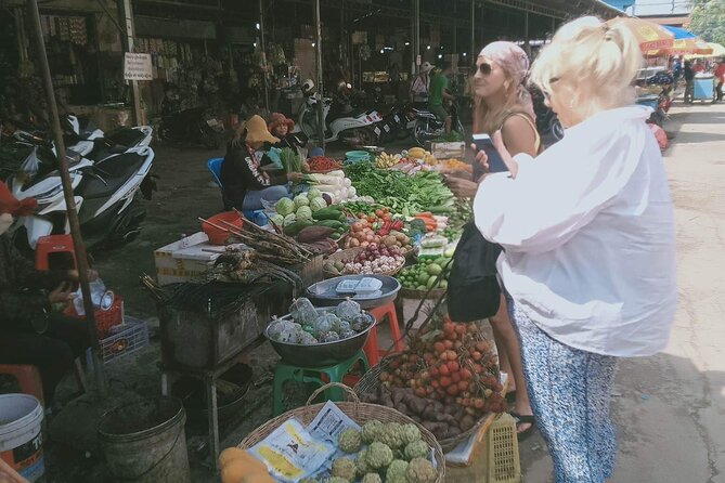 3-Hour Siem Reap Guided Cooking Class and Market with Pick up - Sitting down to eat what you made