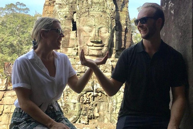 A Day Angkor Wat Sunrise Tour, Ta Prohm & Hidden Gems Beng Mealea - Bayon’s smiling faces and a change of mood