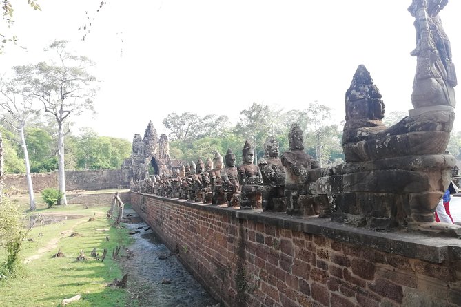 Afternoon Angkor Wat Private Tour with Sunset - Ta Prohm and the trees over the ruins