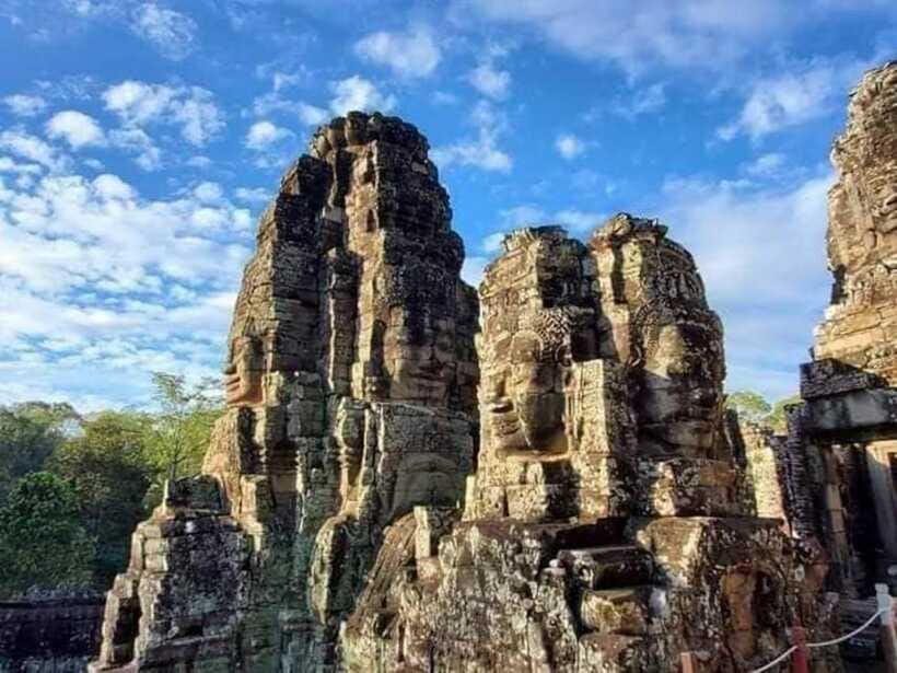 Angkor Cycling Tour - Bayon Temple and the stone faces of Angkor Thom