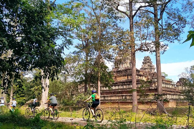 Angkor Sunrise Bike Tour - Breakfast & Lunch included - Breakfast with the temples nearby