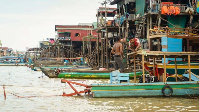 Angkor Wat: 2-Day Sunrise and Floating Village Tour - Angkor Thom: Bayon, Baphoun, and royal scale