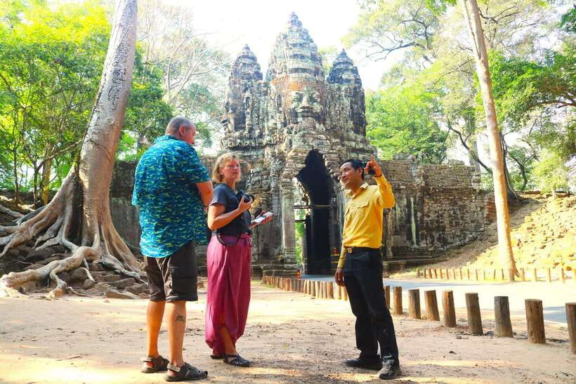 Angkor Wat: Highlights and Sunrise with Spanish Guide - Angkor Wat at sunrise, from a quieter approach