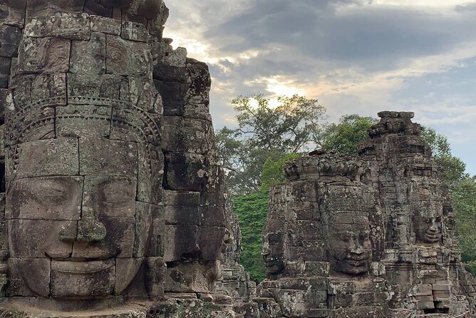Angkor Wat Sunrise and Tonle Sap Cruise Sunset Tour - Angkor Wat at sunrise, from East Gate to West Gate