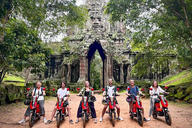 Angkor Wat Sunrise Tour By E-Bike Experience With Breakfast Included - Riding through Angkor Thom to Bayon
