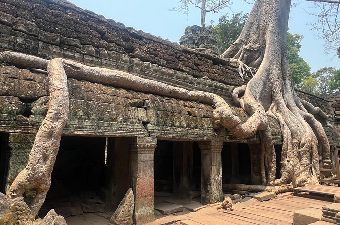 Bangkok to Angkor Wat 2 Days 1 Night by Flight - Bayon and the faces of Angkor Thom