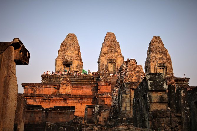 Best Temples Day Tour in Siem Reap with Sunset - Bayon’s stone faces and royal city center