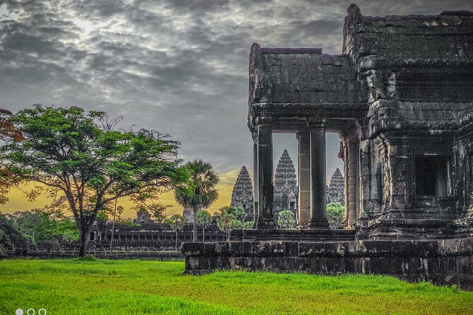 Best Temples Day Tour in Siem Reap with Sunset - Ta Prohm, where trees press against stone