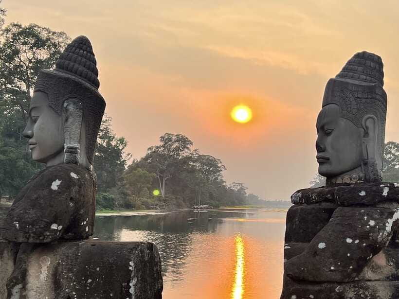 Explore Angkor Wat by Bike and Sunset - 3:00 pm: Bayon’s smiling stone faces