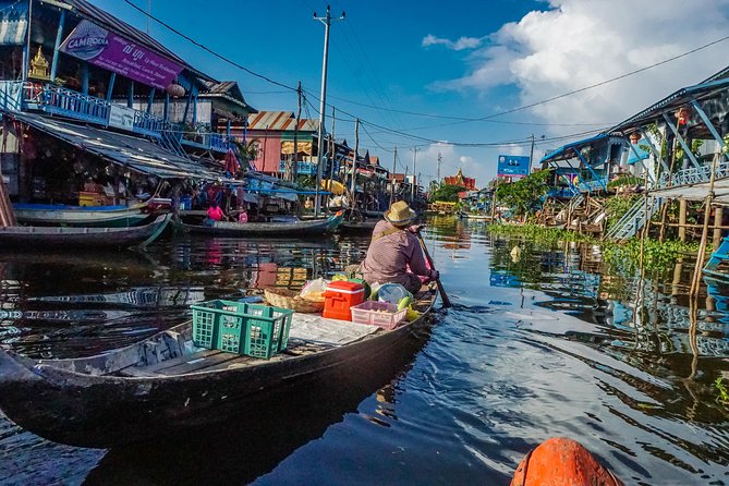 Explore The Kampong Pluk Floating Village - Walking through Kampong Phluk’s tall homes