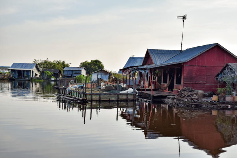 Floating Village Tour with Khmer Meal & Beer - Sunset on Tonle Sap with a drink