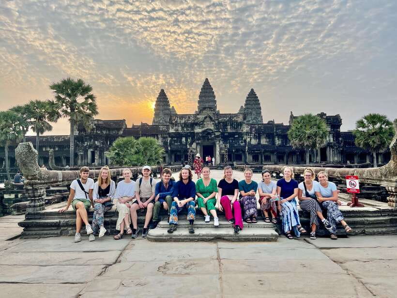 From Siem Reap: Angkor Wat Sunrise and Temples E-Bike Tour - Ta Prohm, where trees claim the ruins