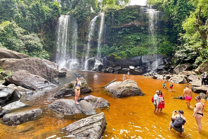 Kulen Waterfall and Banteay Srei -Lady Temple - The Big Buddha, river carvings, and waterfall swim