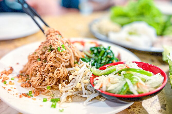 Old Siem Reap Sunset Food Tour by Tuk-tuk - Yi Nget and the case for the beef skewer stop