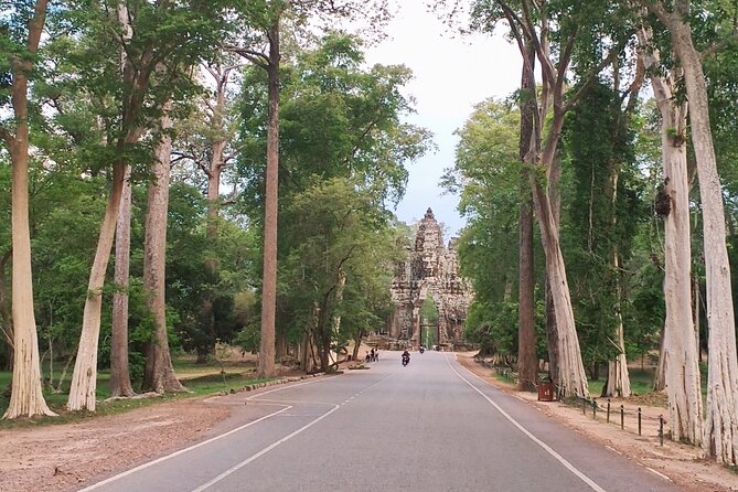 Private One Day Tour with Sunrise at Angkor Wat - Baphuon, the reclining Buddha, and steep steps