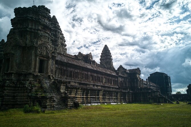 Private Sunrise Angkor Wat Tour with pickup from your hotel - Ta Prohm, where trees frame the ruins