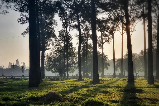 Private sunrise tour to Angkor Wat & other highlights with Professional Guide. - Bayon’s stone faces close the temple circuit