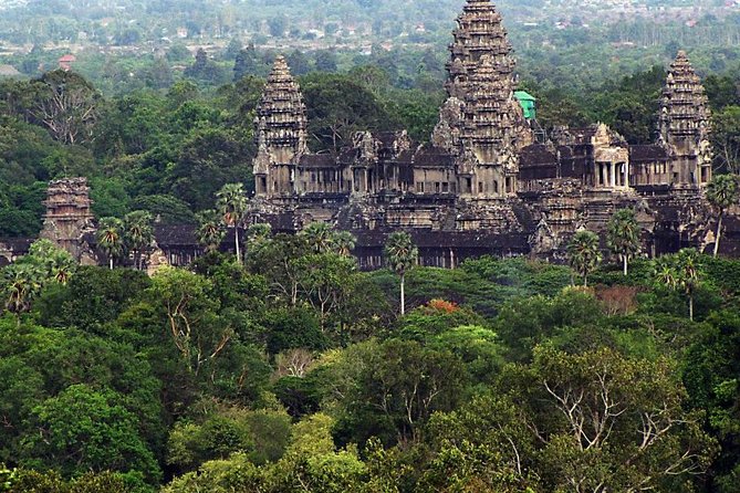 Shared Tour to Angkor Wat, Bayon and Ta Prohm Temples - Bayon and its carved stone faces