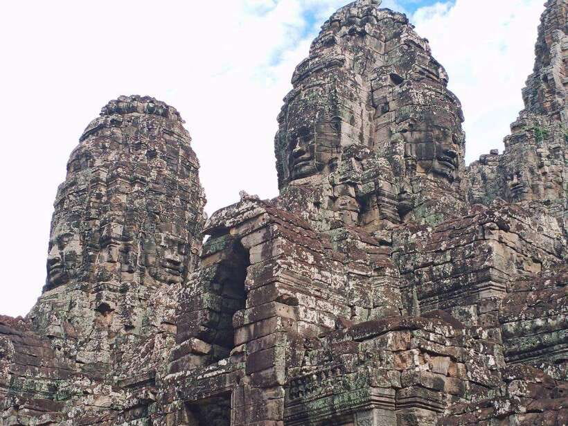 Siem Reap: Angkor Wat, Angkor Thom, and Banteay Srei Tour - Bayon and the famous stone faces
