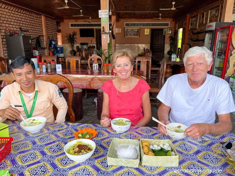 Siem Reap: Angkor Wat Sunrise and Market Tour by Jeep - Shopping and snacking at a Siem Reap market