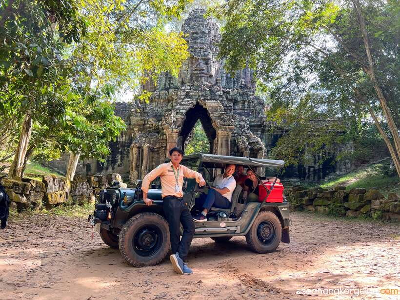 Siem Reap: Angkor Wat Sunrise and Market Tour by Jeep - Riding between temples in a private jeep