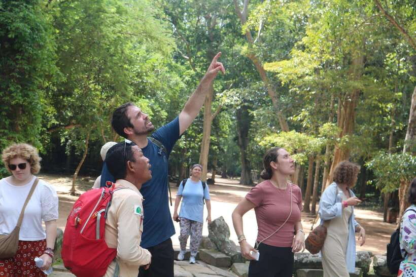 Siem Reap: Angkor Wat with German or English Guided Tour - Ta Prohm: stone, roots, and narrow passages