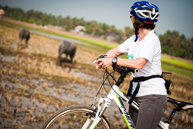 Siem Reap Countryside Guided Tour by Bike and E-Bike Private Tour - A village home, Cambodian snacks, and a slower pace