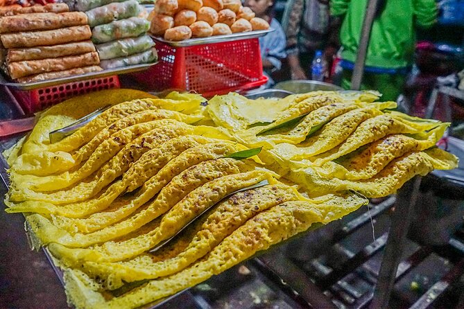 Siem Reap Evening Food Tour - Inclusive 5 stops Local Tastings - 7:00 pm, fruit, spring rolls, herbs, tofu, and BBQ snails