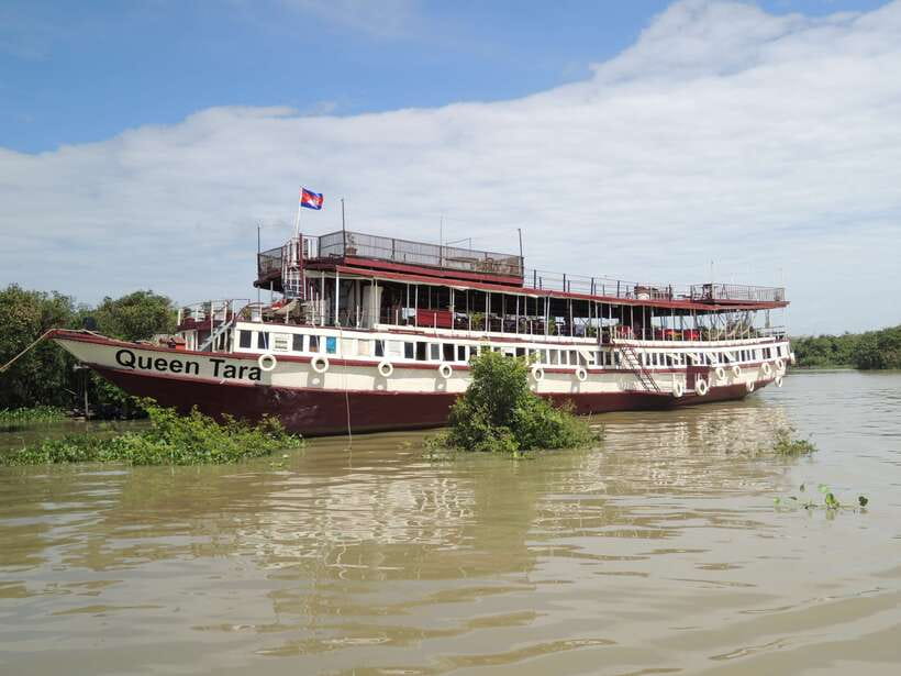 Siem Reap: Floating Village Half-Day Tour - Boarding the boat near the floating village