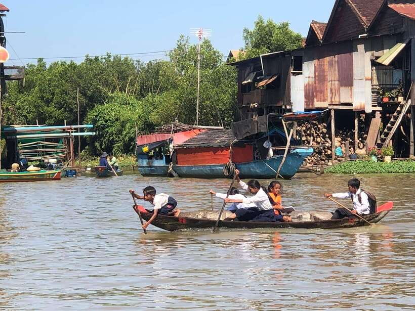 Siem Reap Floating Village Kampong Phluk Sunset with Boat - Walking through homes on stilts