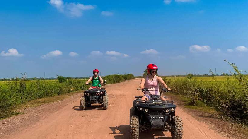 Siem Reap: Khmer Village and Fish Farm ATV Tour - Seeing large fish at a local farm