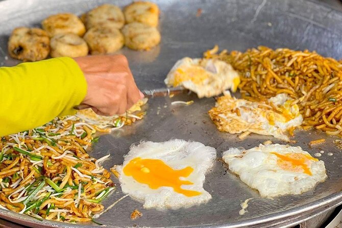 Siem Reap: Local Street Food Experience by Tuk-Tuk - The guide is the heart of the experience
