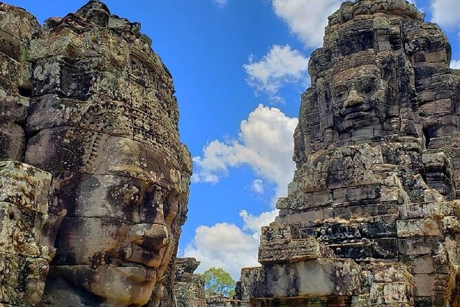 Siem Reap Private Full Day Angkor Wat Tour with Sunset or Sunrise - Angkor Thom South Gate and Bayon’s stone faces