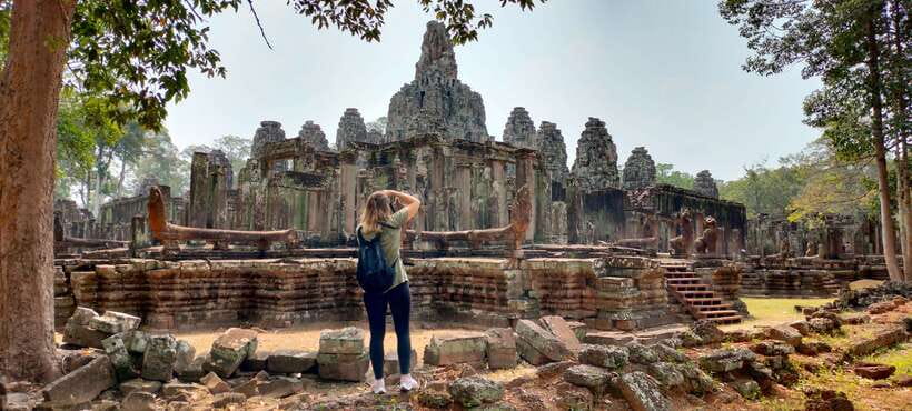 Siem Reap Tour Guide: Angkor Wat Sunrise Tour & Beng Mealea - Bayon and the many-faced center of Angkor Thom