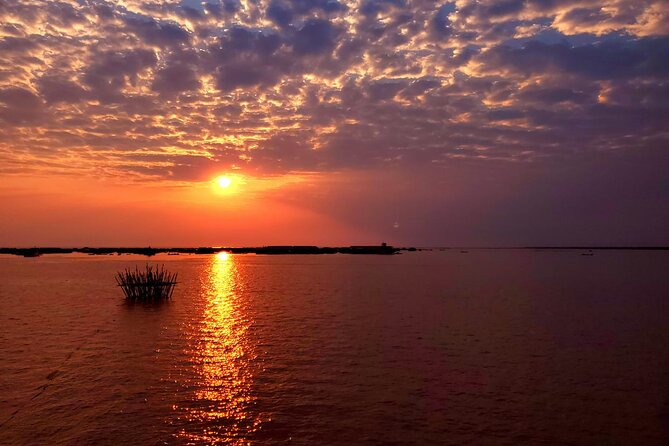 Sunset Dinner and drinks includes a Floating Village cruise tour. - Dinner: buffet when numbers are higher, fixed menu when they are not
