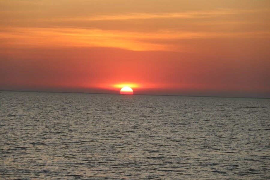 Sunset Dinner Tour: Tonle Sap Lake Floating Village - Cruising past homes, schools, and churches