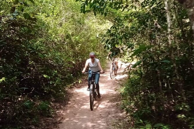 Sunset or sunrise bicycle tour around Angkor Wat and nearby temples - Banteay Kdei and Ta Keo: quieter details and a stark pyramid