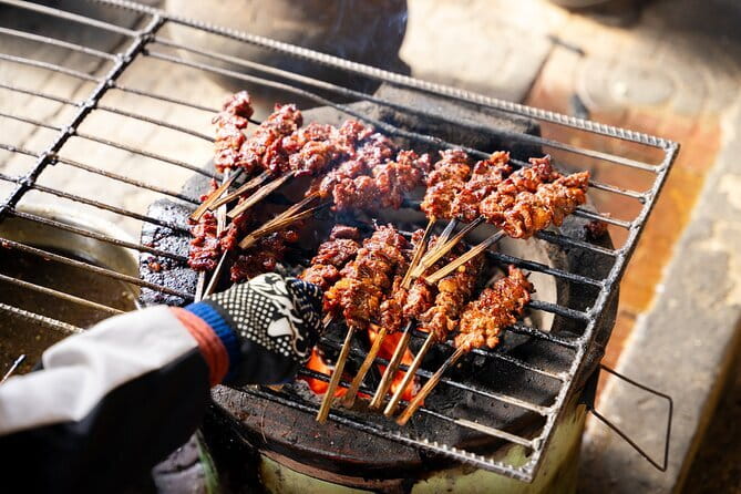Ultimate Siem Reap Food Tour by Tuk Tuk - 20 Tastings, 8 Stops - Wat Damnak starts the evening with a simple bite