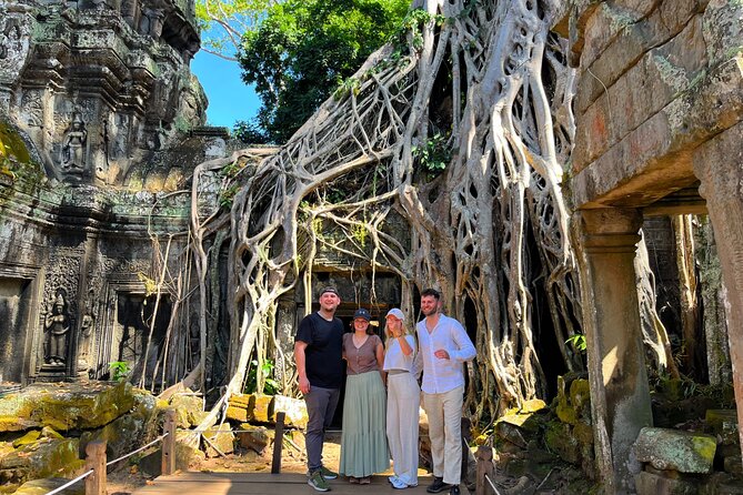 Unveil The Magic Of Angkor Wat Sunset In A Day Personalized Tours - Bayon: nearly 200 smiling stone faces